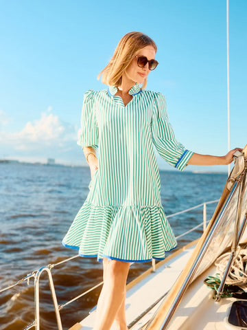 Naomi Dress: Striped with a ruffle V-neckline and 3/4 sleeves. Available in sizes XS, S, M, L, XL.