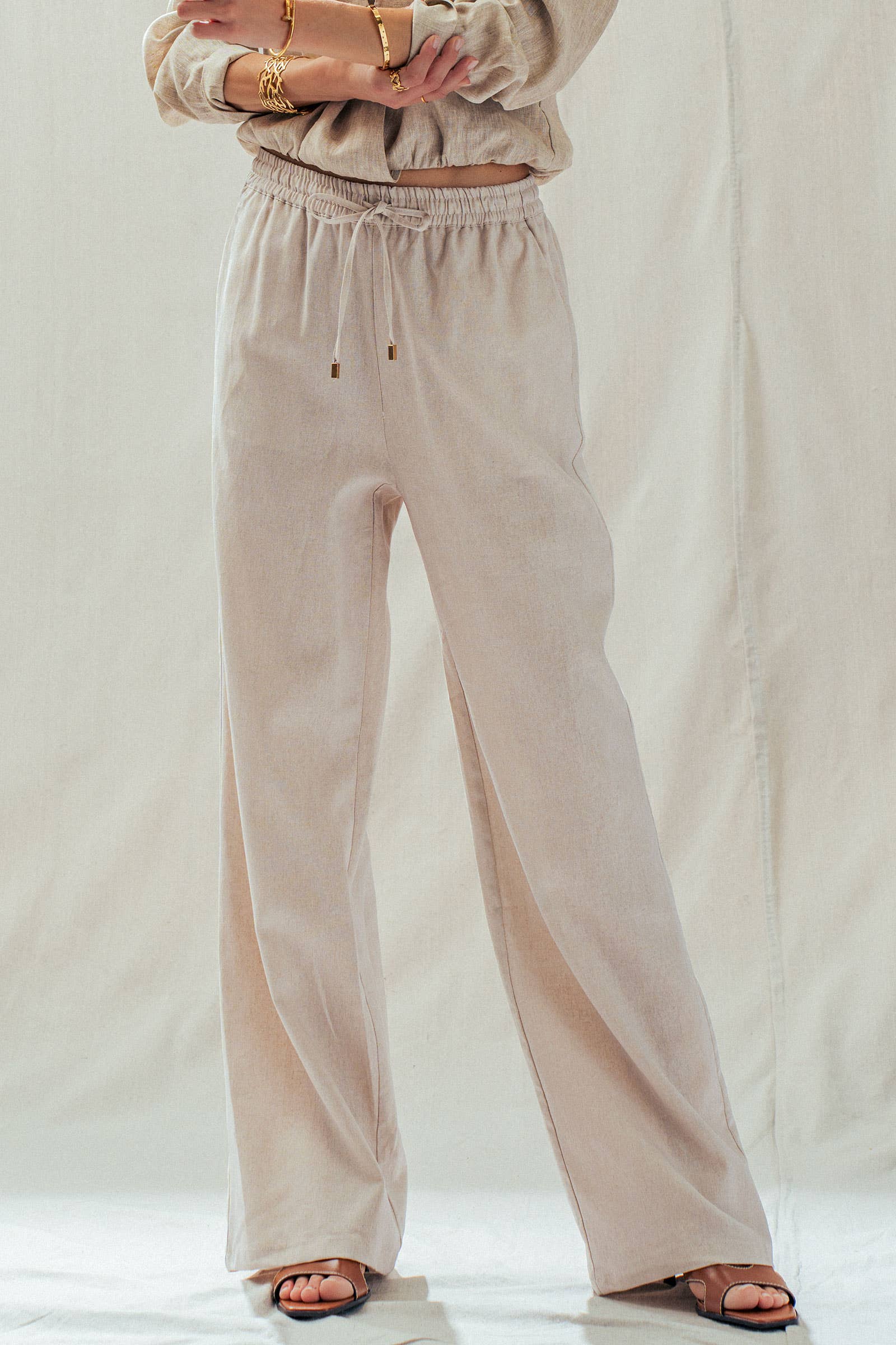 Mint Jelly Linen Blend Wide Leg Drawstring Pants in light beige. Available in sizes XS–XL.