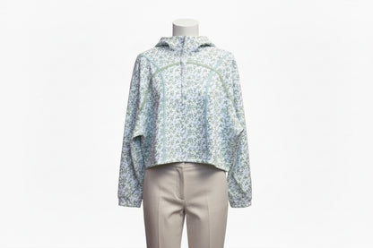Robin Blue Pullover: light blue/white floral long-sleeve zip hoodie, lightweight fabric. Sizes: S, M, L, XL.