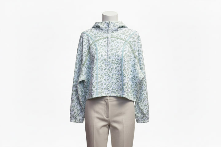 Robin Blue Pullover: light blue/white floral long-sleeve zip hoodie, lightweight fabric. Sizes: S, M, L, XL.