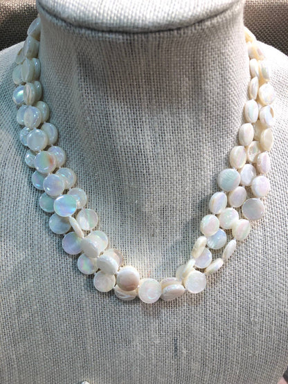 Mother of Pearl 3 Strand Necklace with round iridescent white beads and a magnetic clasp. Available in 16", 18", and 20".