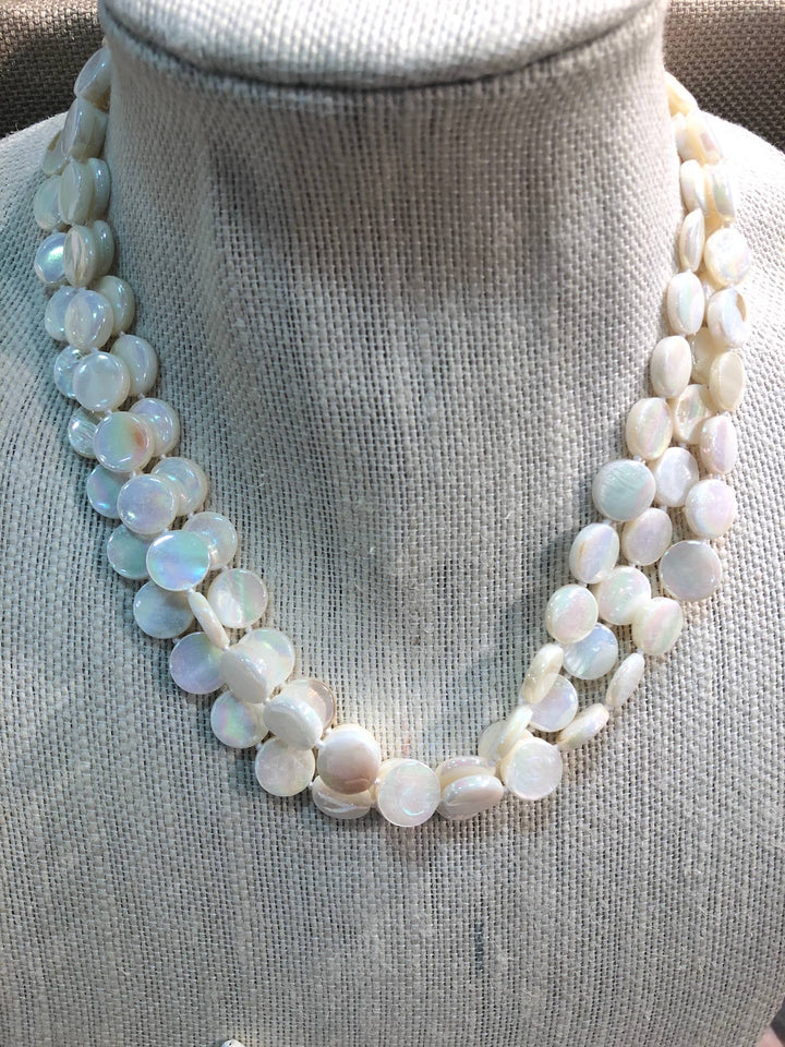 Mother of Pearl 3 Strand Necklace with round iridescent white beads and a magnetic clasp. Available in 16", 18", and 20".