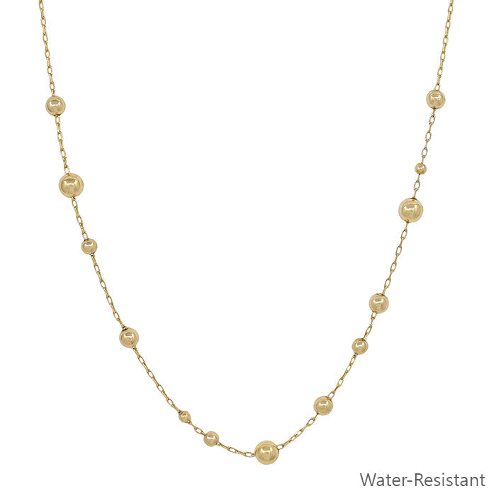 Water Resistant 5MM Beaded Chain Necklace: delicate gold graduated chain with evenly spaced small beads. Available in multiple sizes.