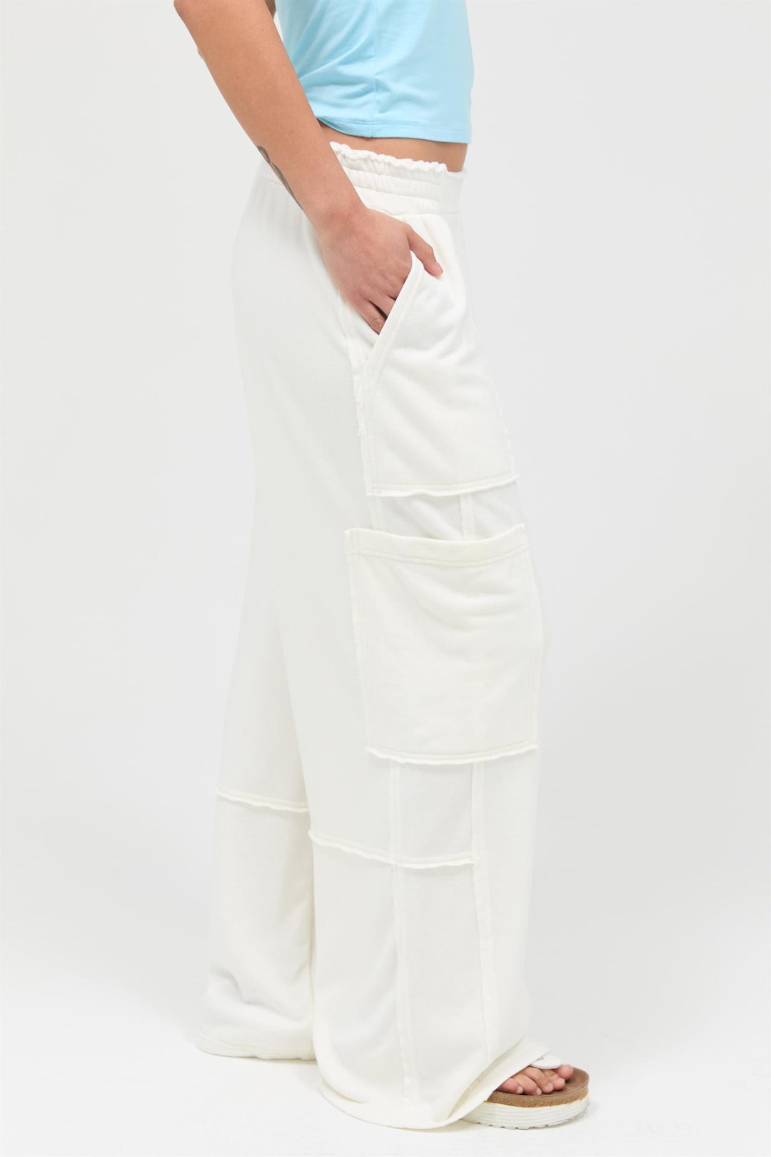Mineral Wash Wide Leg Cargo Pants in white. Available in sizes XS-XL.