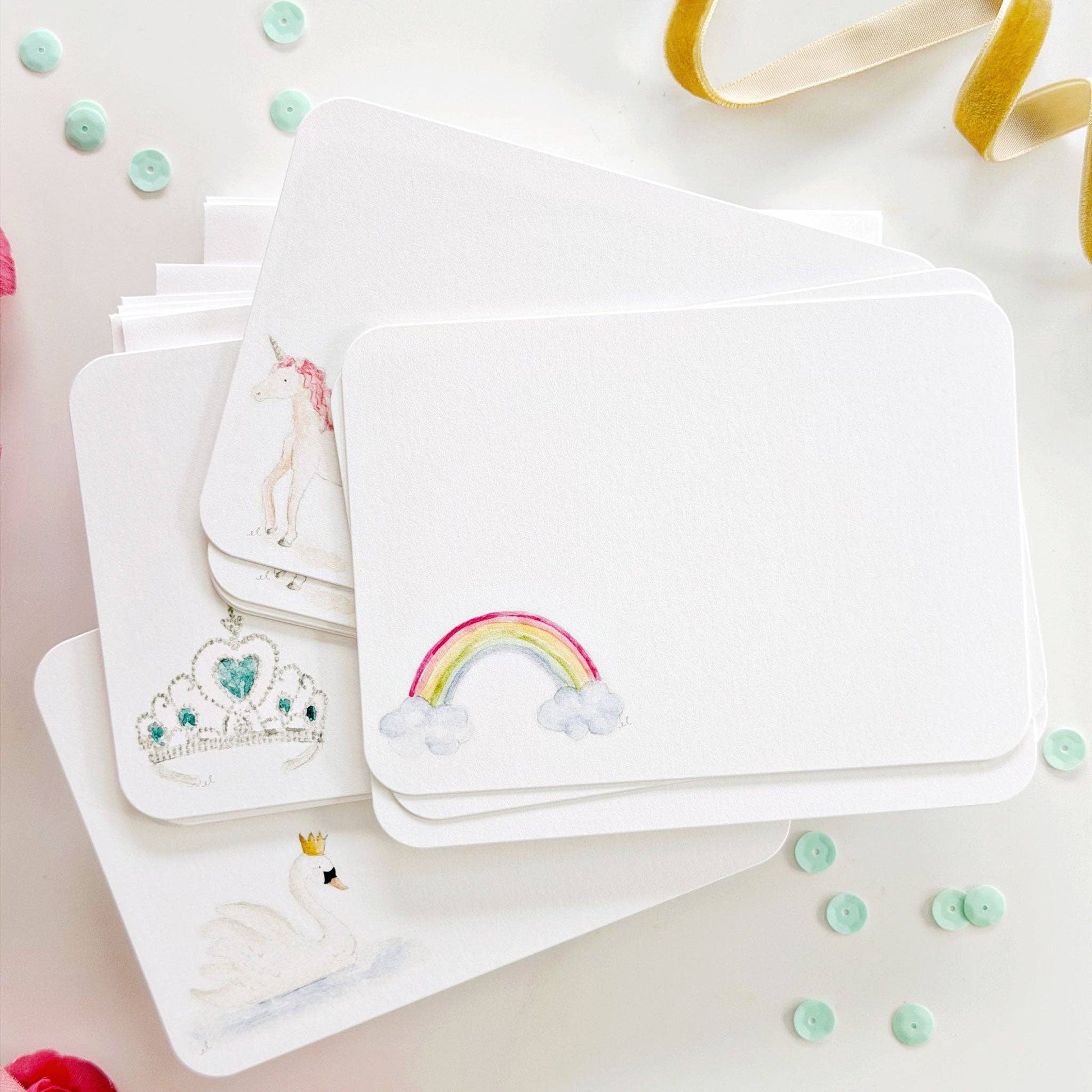 Fairytale flat notes with watercolor unicorn, tiara, rainbow, swan. Velvet ribbon, pastel buttons. Available in 4x6 inches.