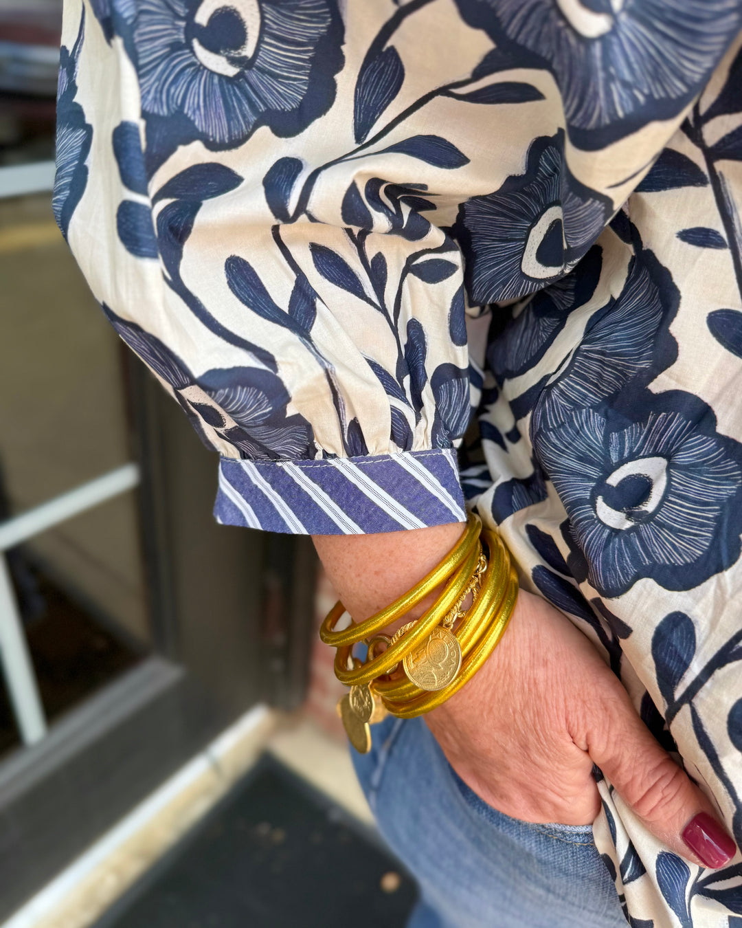 Bonnie Ruffle Floral Blouse featuring ruffle details and floral print. Available in sizes XS–XL.