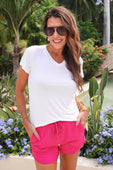 Solid Raspberry Everyday Shorts, mid-thigh length, available in sizes XS-XXL.
