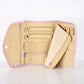 Quilted Jewelry Clutch - Light Pink. Features multiple compartments and holders, slots for rings, zippered pockets, and snapped straps for various jewelry items. Trimmed with light pink fabric. Sizes: One size available.