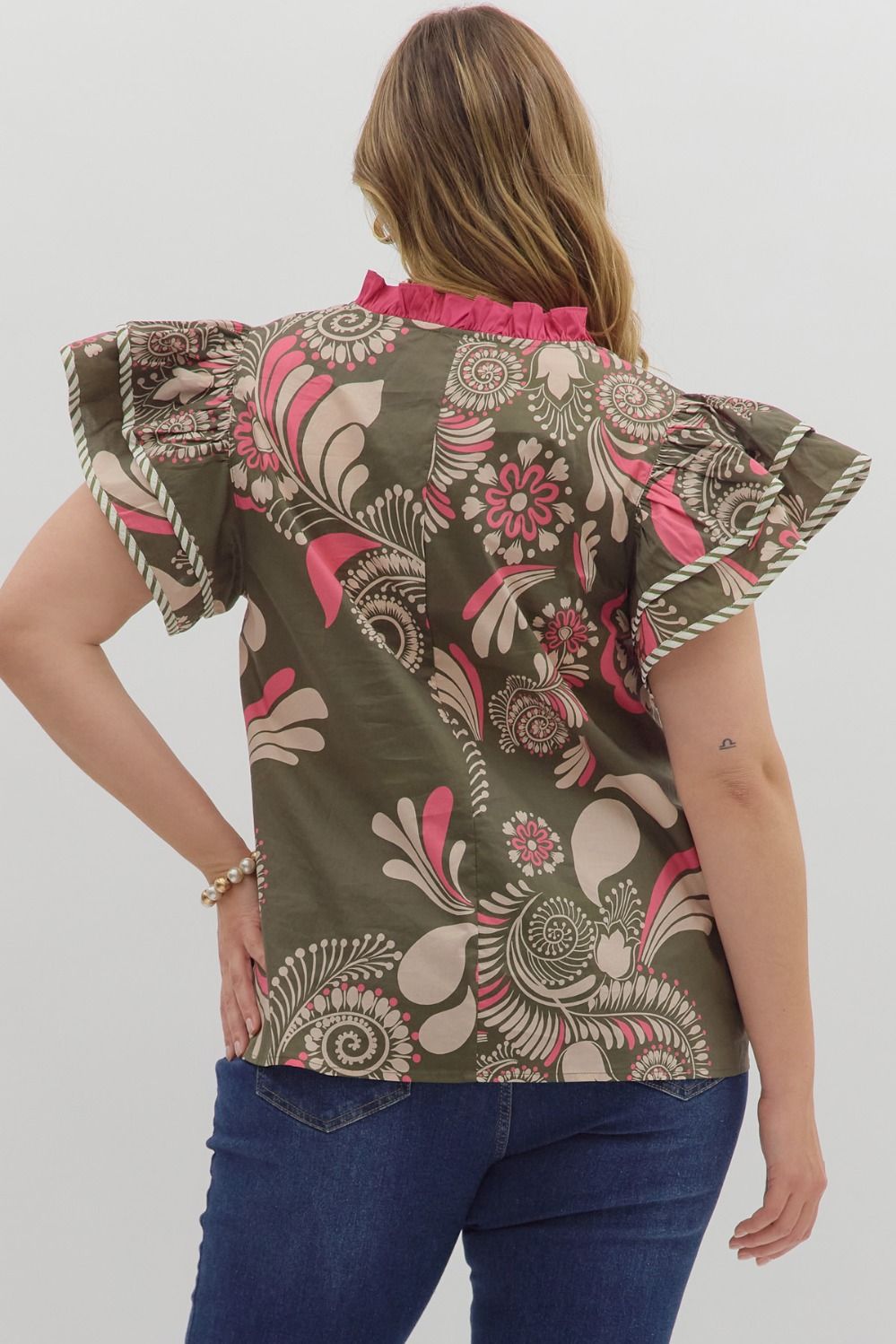 Paisley Tiered Top with flutter sleeves, olive green, pink, and beige floral pattern. Available in sizes XS-XL.