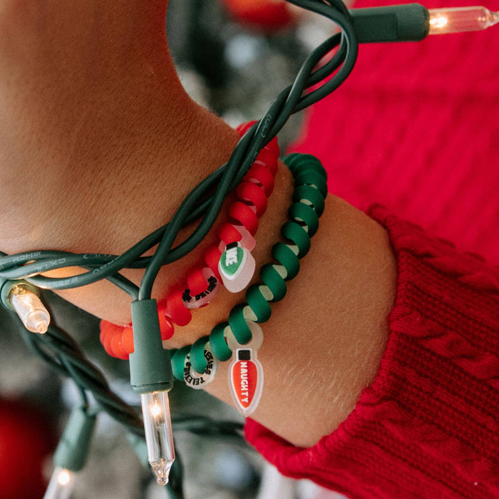 Spiral Hair Coils | Small | Naughty or Nice Hair Ties in red and green with festive charms, available in small size.