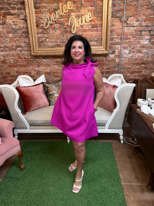 Magenta tie-neck sleeveless dress. Sizes available: XS-XL.