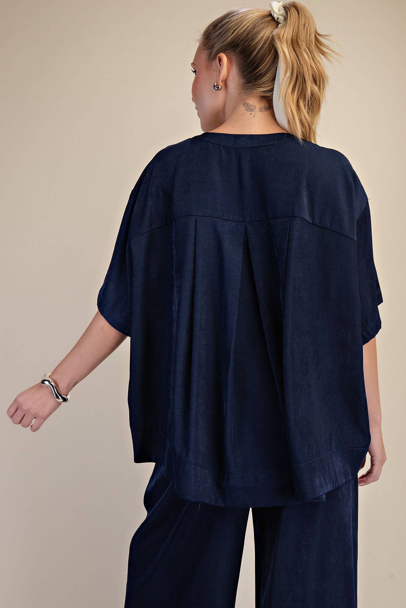 Navy Round Neck Band Oversize Shirt with relaxed fit, pleated detail, round neckline. Available in sizes S-XL.