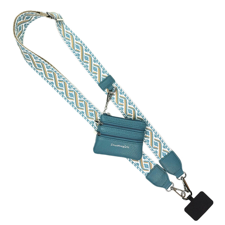 Teal crossbody pouch with wide geometric strap, zip pocket, keyring, black tag. Available in S, M, L.