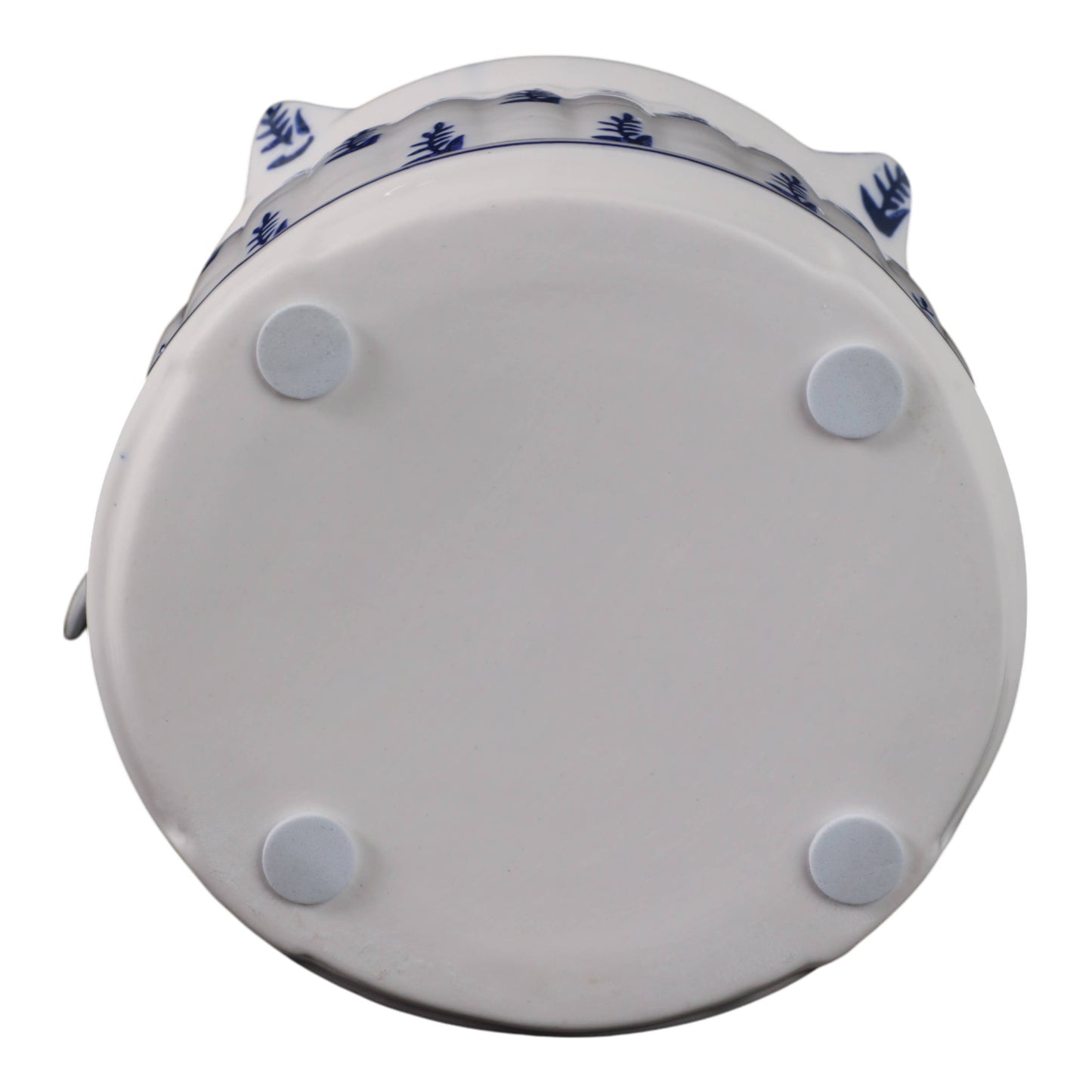Flat bottom of 8 in. White/Blue Chinoiserie Pagoda Birdhouse with four pads and blue pattern at edge.