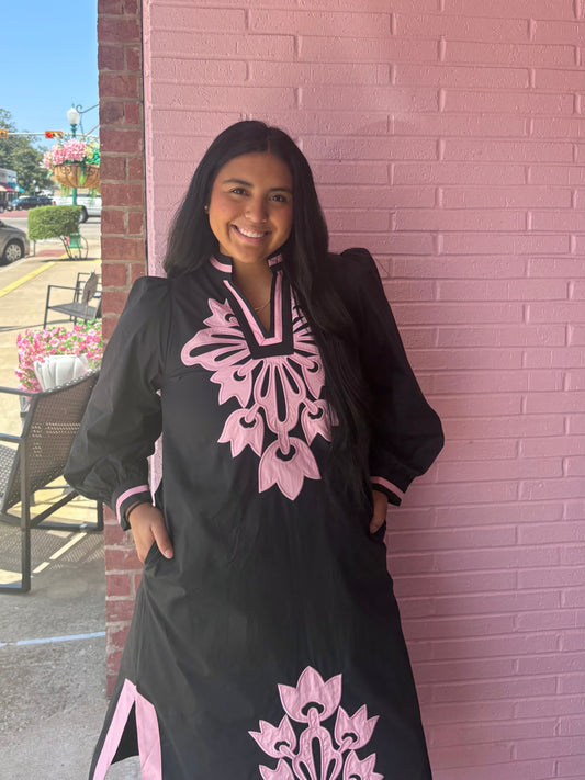 Black Floral Appliqué Midi Dress with large light pink baroque floral appliqués, features pockets. Available in sizes XS–XL.