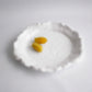 Vida Havana Extra Large Round Platter with a textured, uneven edge; also available in other sizes.