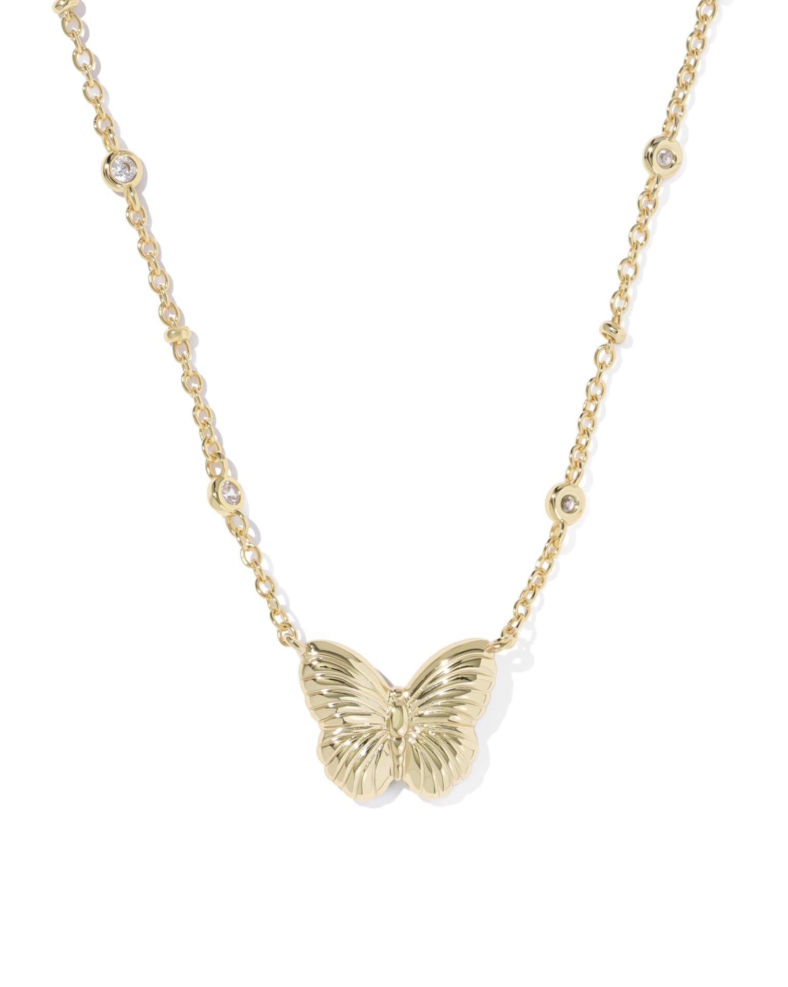 Gold necklace with a detailed butterfly pendant and spaced cubic zirconia gems. Available in 16" and 18" lengths.