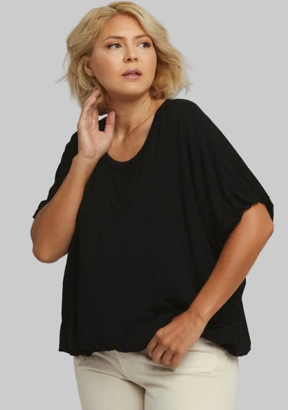 Loose-fitting Bubble Sleeve & Hem Top, available in sizes XS–XL.