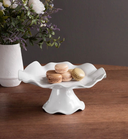 The VIDA Havana Small Pedestal Cake Plate, made of premium melamine, is shown displaying macarons. Available sizes: small.