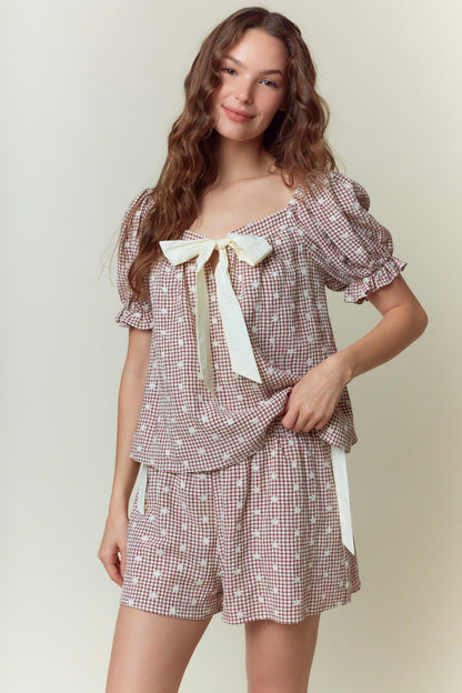 Gingham Embroidered Short Set with puffed sleeves and large cream bow at neckline. Available in sizes XS-XL.