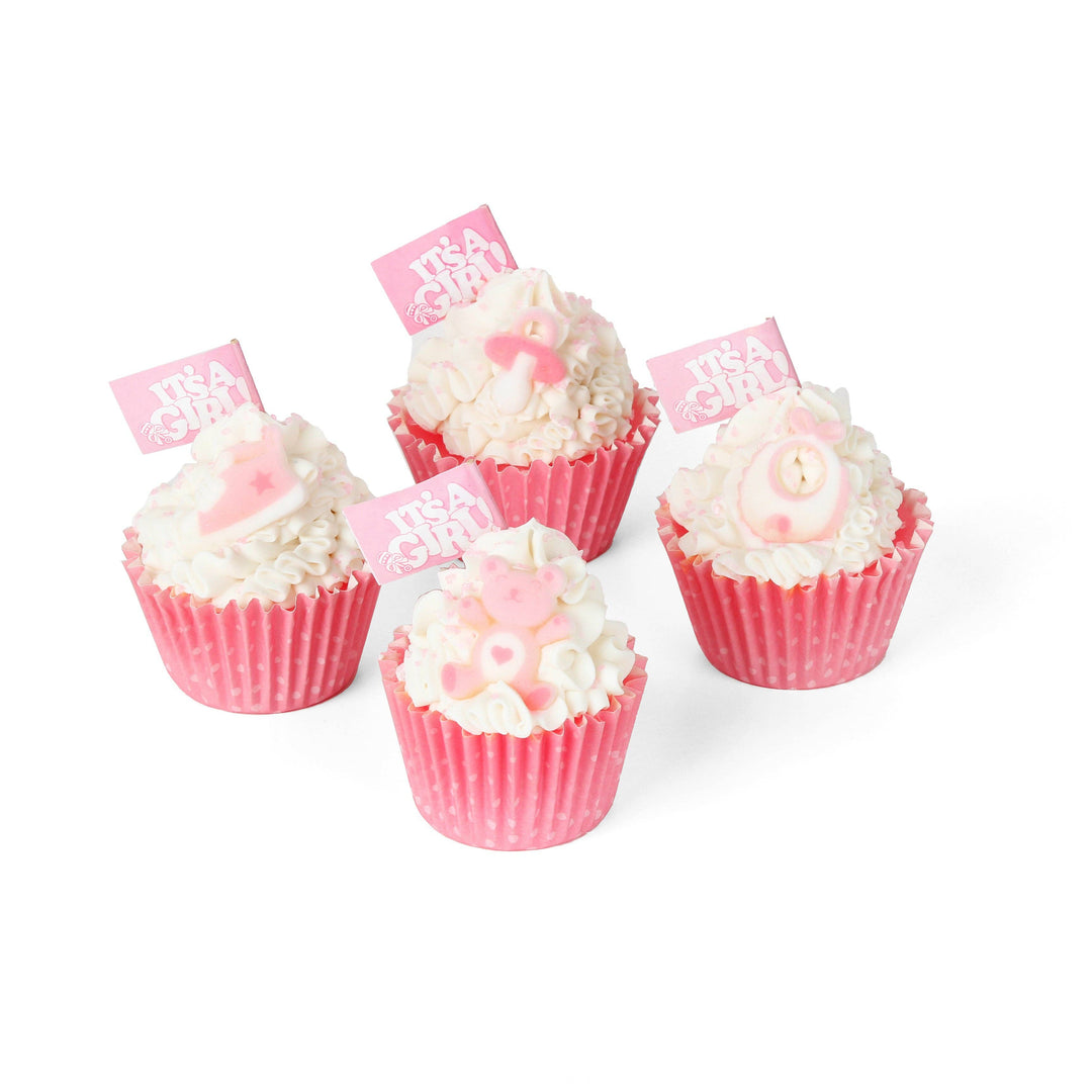 Set of four handmade "It's a Girl" cupcake soaps, pink wrappers, white frosting, with baby-themed toppers. Sizes: standard cupcake.