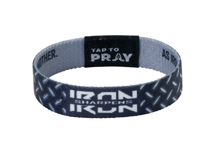 Tap To Pray™ Iron elastic prayer wristband with diamond plate pattern, “IRON SHARPENS IRON” text, and black “TAP TO PRAY” tag. Available in various sizes.