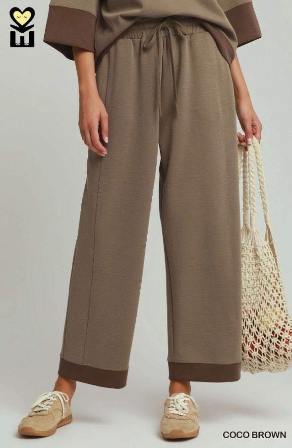 Coco Brown Colorblock Straight Pants with darker brown cuffs, available in sizes XS to XL.