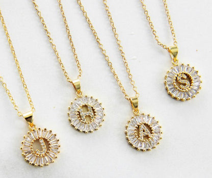 Stainless steel necklaces with gold CZ initial pendants (D, R, A, S); available in multiple sizes.