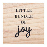 Square wood ceramic ornament, “Baby’s First Christmas,” inscribed “Little bundle of joy.”.