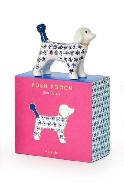 Posh Pooch Dog Ceramic Ring Holder, available in three assorted colors and sizes. Features a cheerful dog design with blue floral patterns and a blue tail atop a pink and blue base labeled “POSH POOCH Ring Holder.”.