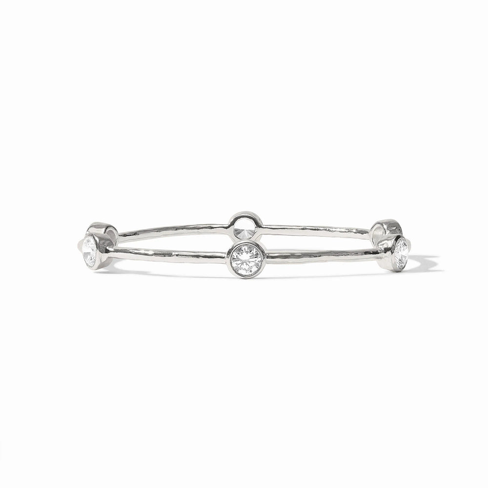 Milano Bangle by Julie Vos: thin, hammered silver plate with three bezel-set clear gemstones. Available in multiple sizes.
