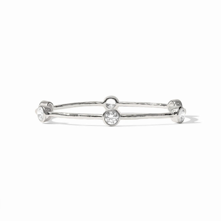 Milano Bangle by Julie Vos: thin, hammered silver plate with three bezel-set clear gemstones. Available in multiple sizes.