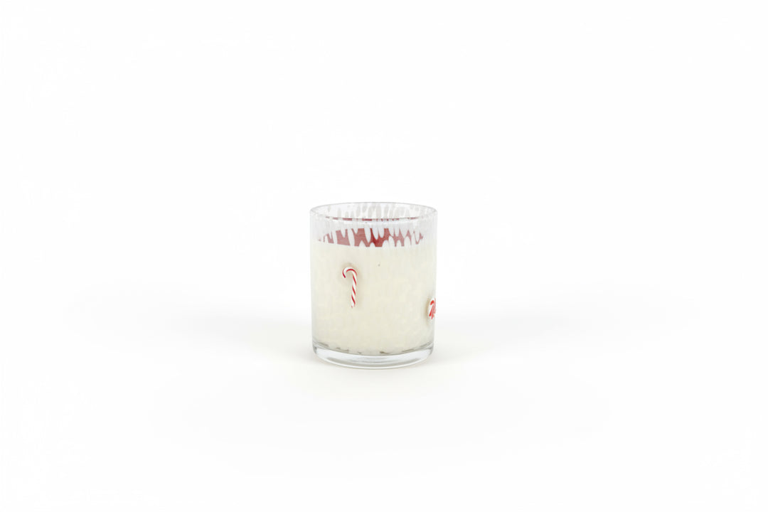 Holiday Soy Candle in a glass container with candy cane designs, filled with creamy white soy wax. Available in multiple sizes.