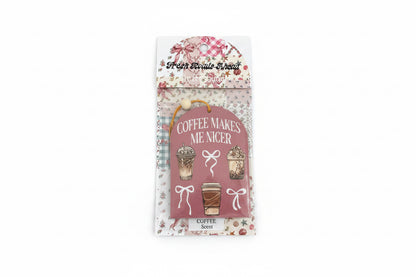 SIMPLY SOUTHERN FRESH ROADS AHEAD coffee-scented pink air freshener, with coffee cup prints and "COFFEE MAKES ME NICER." Sizes vary.