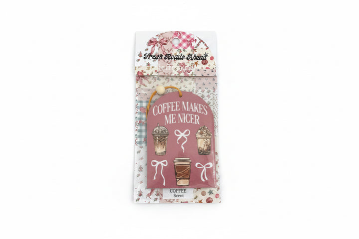 SIMPLY SOUTHERN FRESH ROADS AHEAD coffee-scented pink air freshener, with coffee cup prints and "COFFEE MAKES ME NICER." Sizes vary.