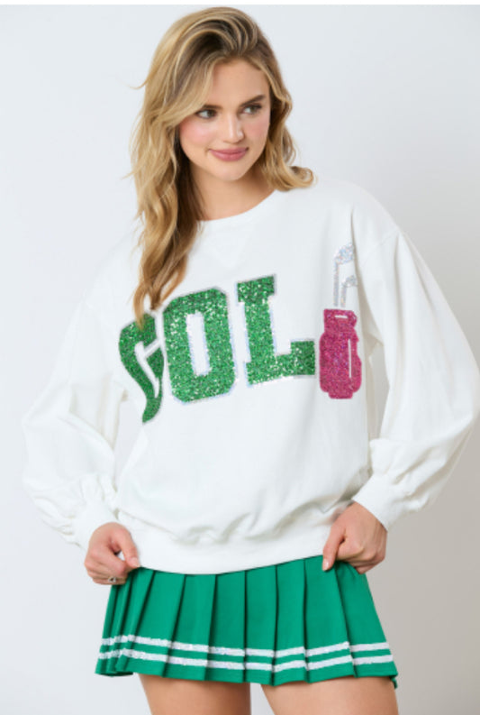 Golf Sweatshirt with green glitter "GOLF" letters and pink golf bag graphic. Available in XS, S, M, L, XL.
