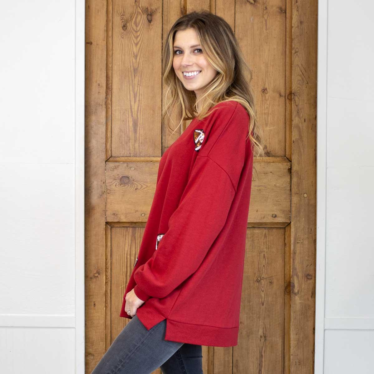 Football Queen Sequin Sweatshirt in red, features sequin detailing. Available in sizes S-XL.