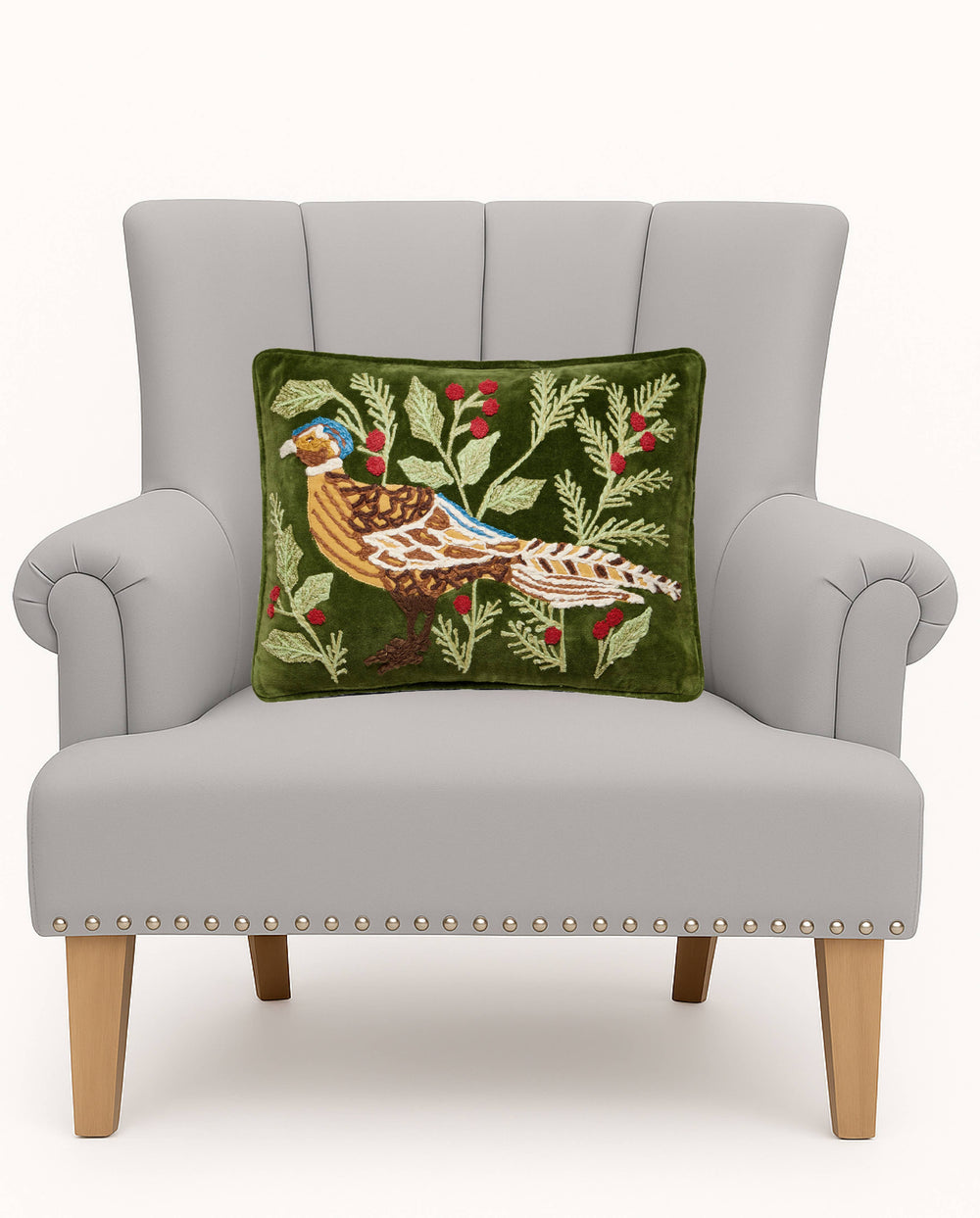 The Pheasant Embroidered Pillow features a colorful bird and foliage design; available sizes include 18″x18″ and 20″x20″.