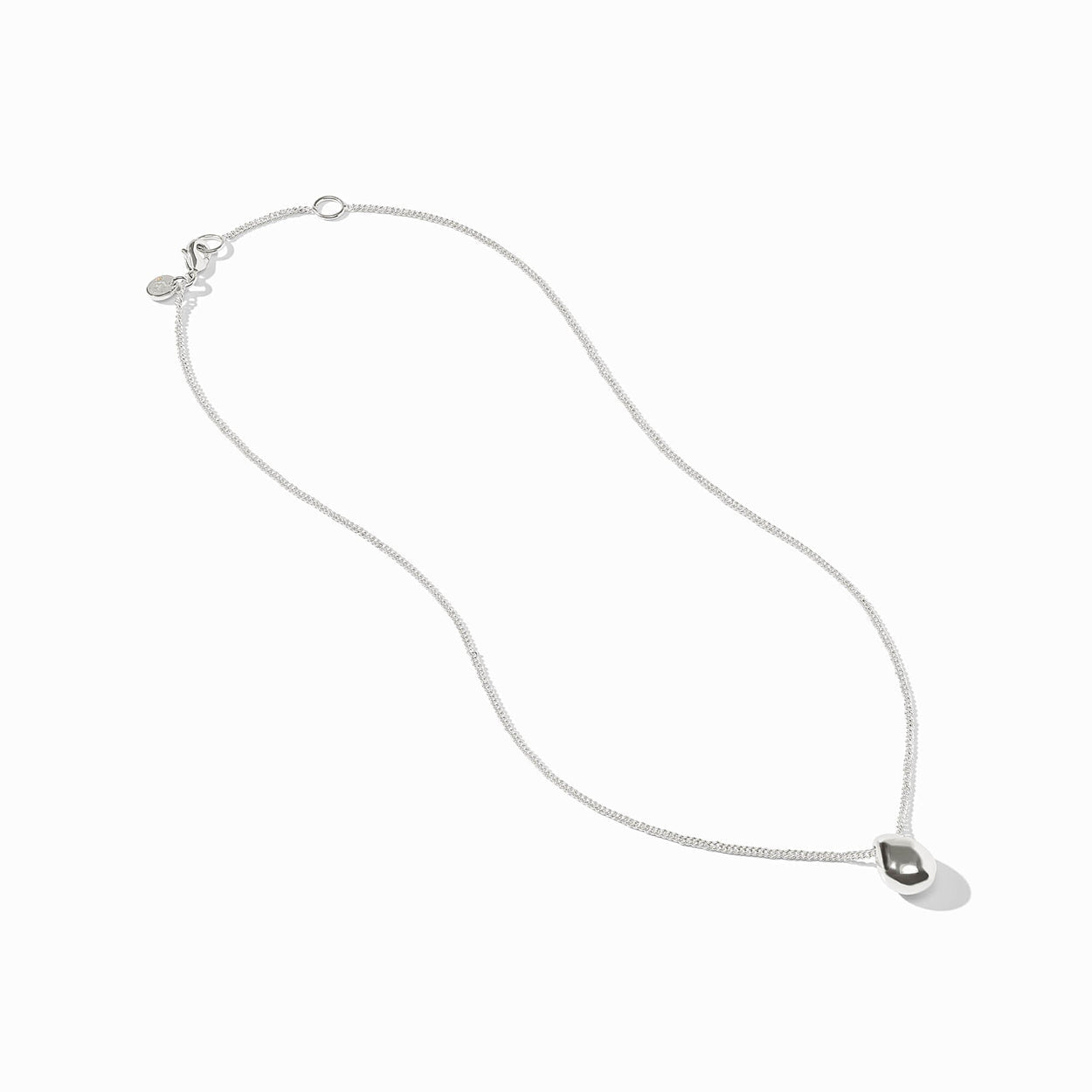 The Wave Delicate Silver Necklace by Julie Vos has a teardrop pendant on an adjustable fine chain. Available in multiple sizes.
