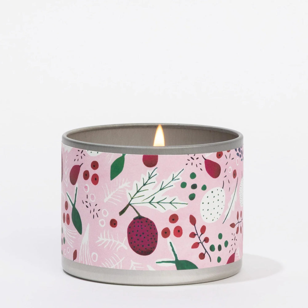Lit Brambleberry 4oz candle in a hand-painted pink tin with botanical berry pattern.