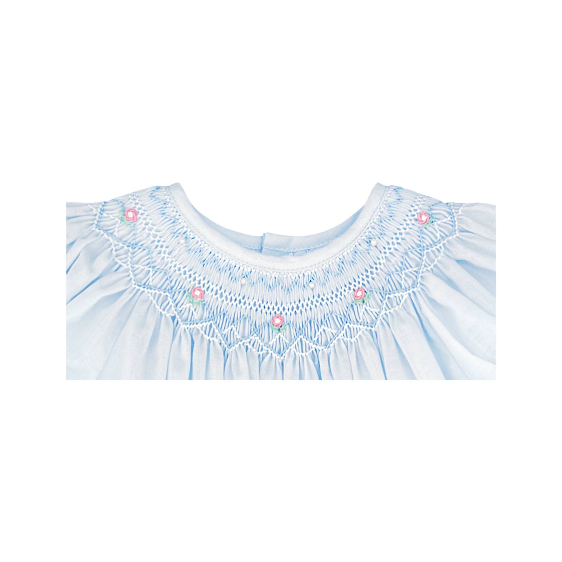 Neckline of Blue daygown with heart smocking and pearls