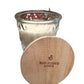 Timeless 12oz. Jar Candle with white soybean wax in glass jar, wooden lid engraved “SUN-KISSED LINEN.” Available in 12oz.
