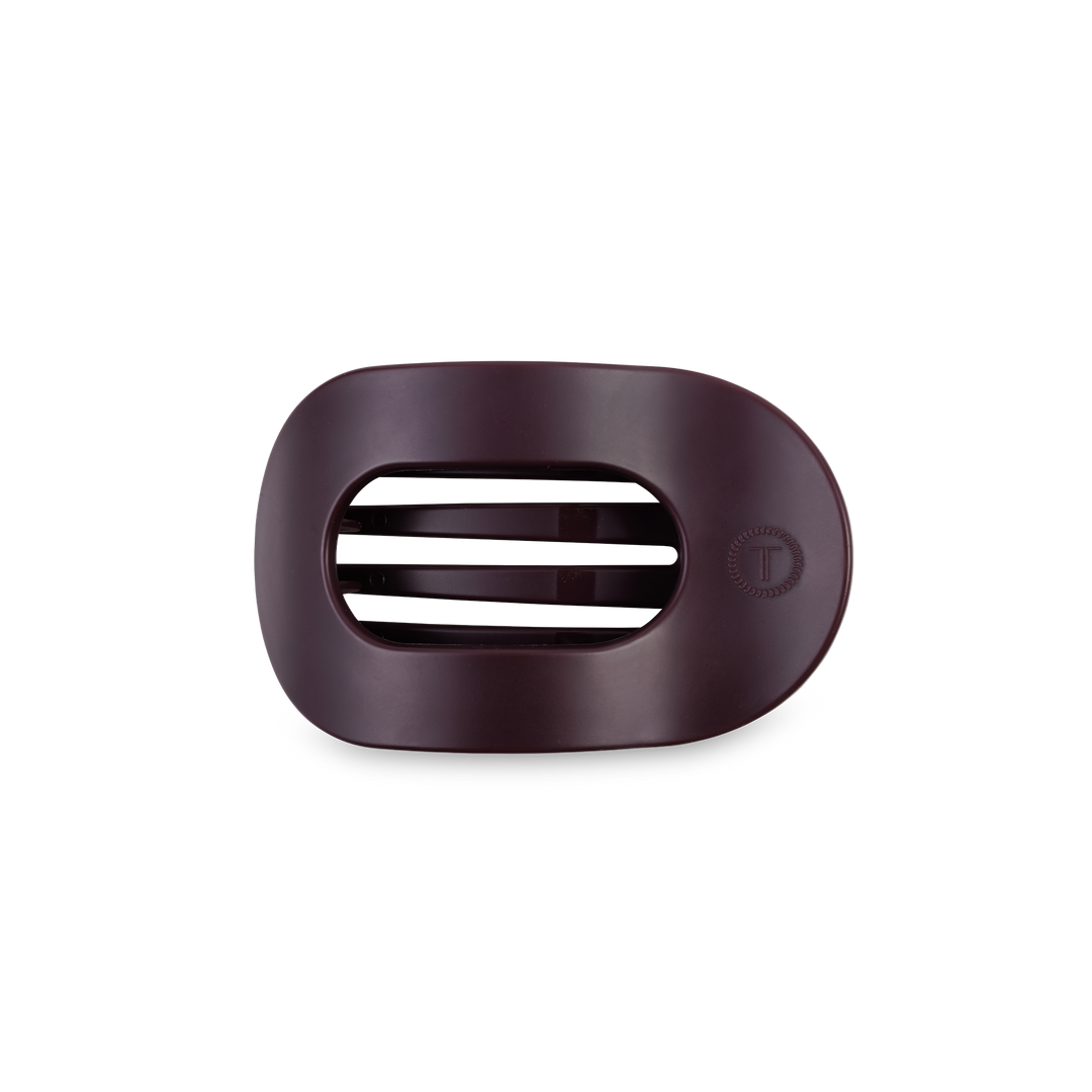 Dark maroon oval plastic soap dish with three center slots and a small circular logo; available in standard and large sizes.