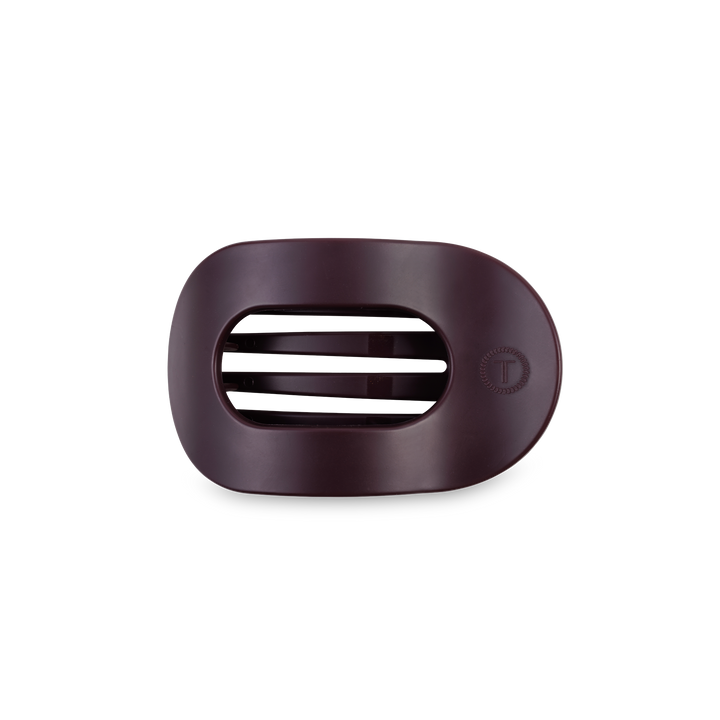 Dark maroon oval plastic soap dish with three center slots and a small circular logo; available in standard and large sizes.