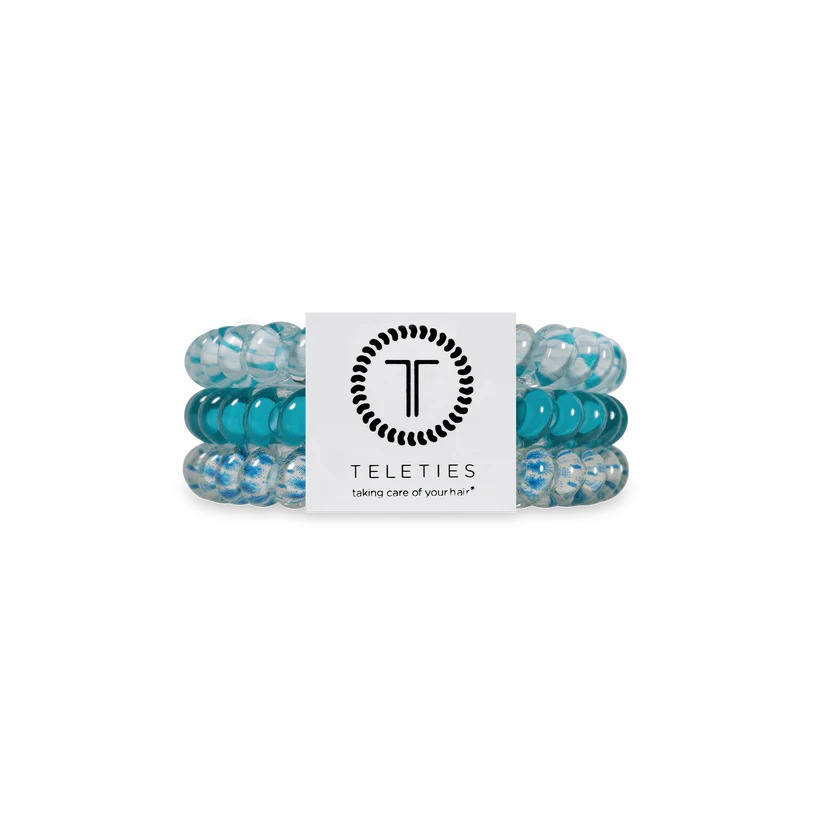 Three blue and clear TELETIES Hair Ties with branded card; available in small, medium, and large sizes.