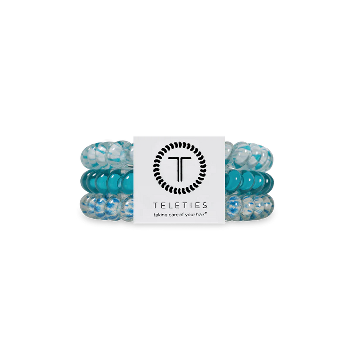 Three blue and clear TELETIES Hair Ties with branded card; available in small, medium, and large sizes.