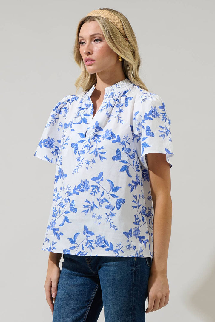 Leya Floral Inaya Split Neck Top with floral print, split neckline. Available in sizes XS–XL.