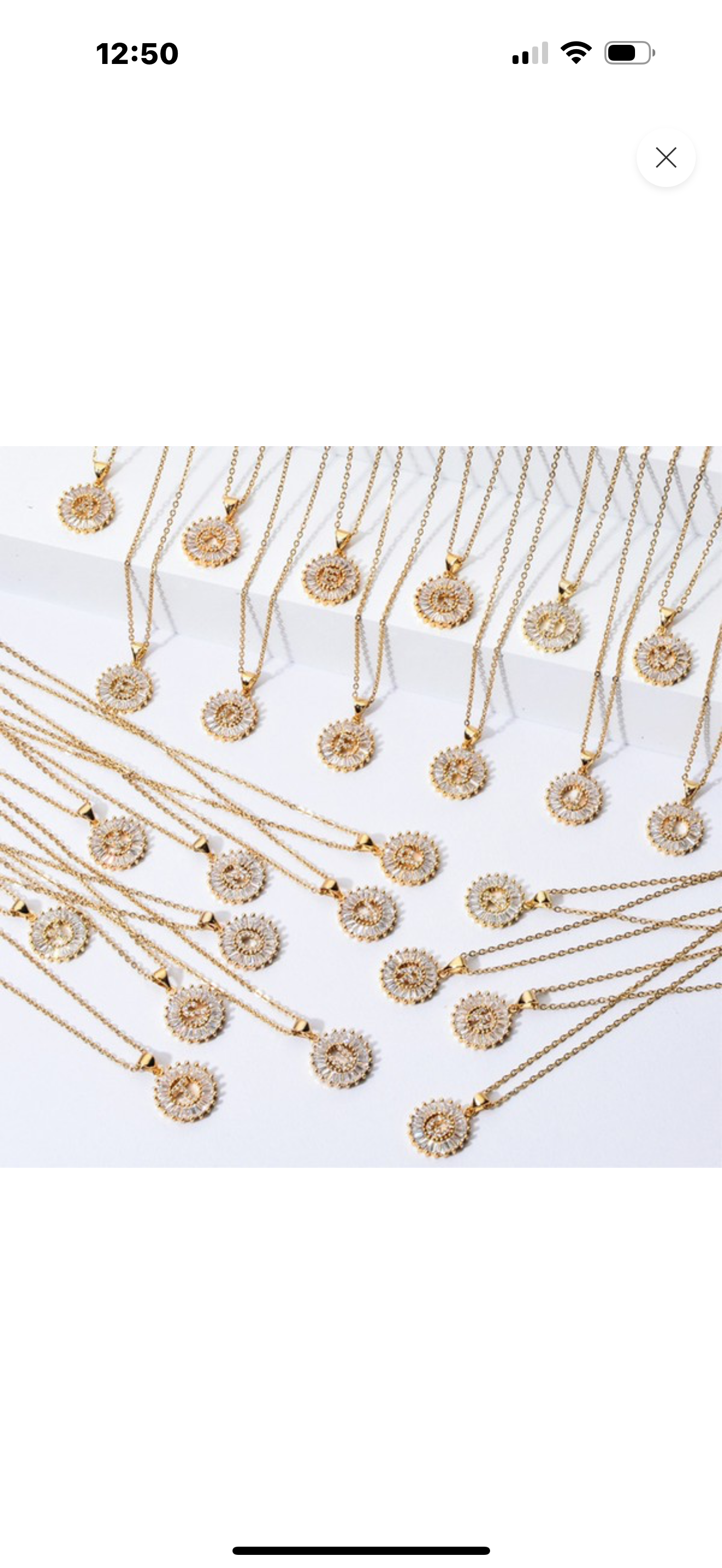 Stainless steel necklaces with CZ initial pendants; available in 16", 18", and 20" lengths.