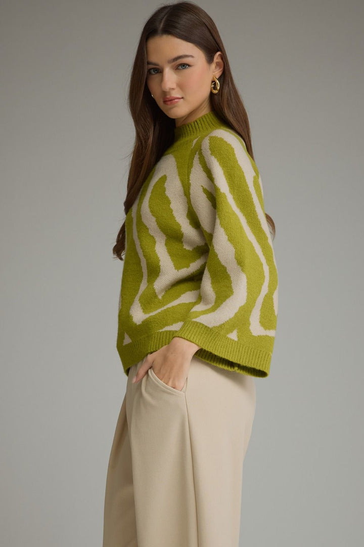 Olive green and beige zebra print mock neck sweater with wide sleeves. Available in sizes S-L.