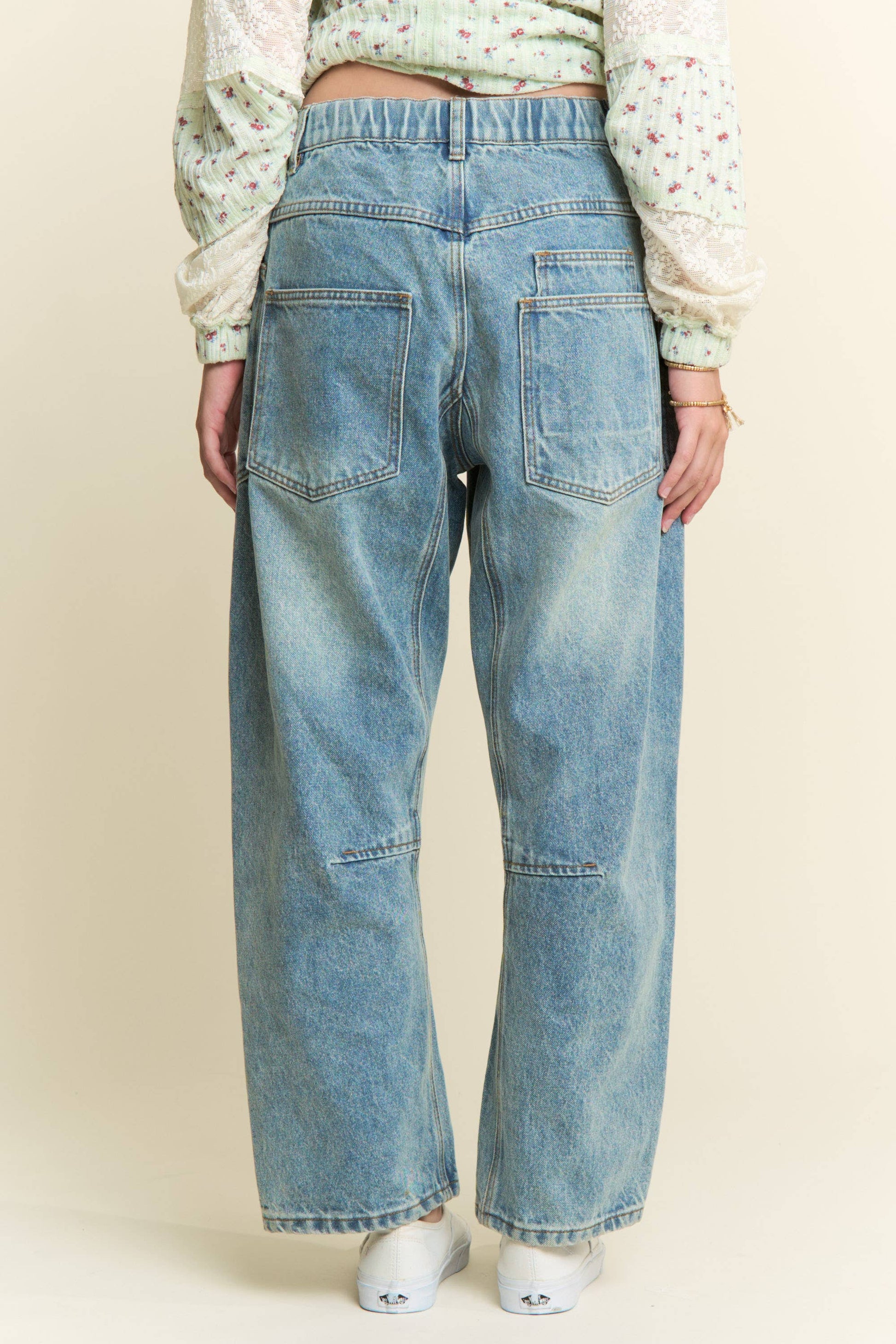 MINERAL WASHED PATCHWORK JEANS in Vintage Wash. Sizes: S. Features vintage wash and patchwork detailing.